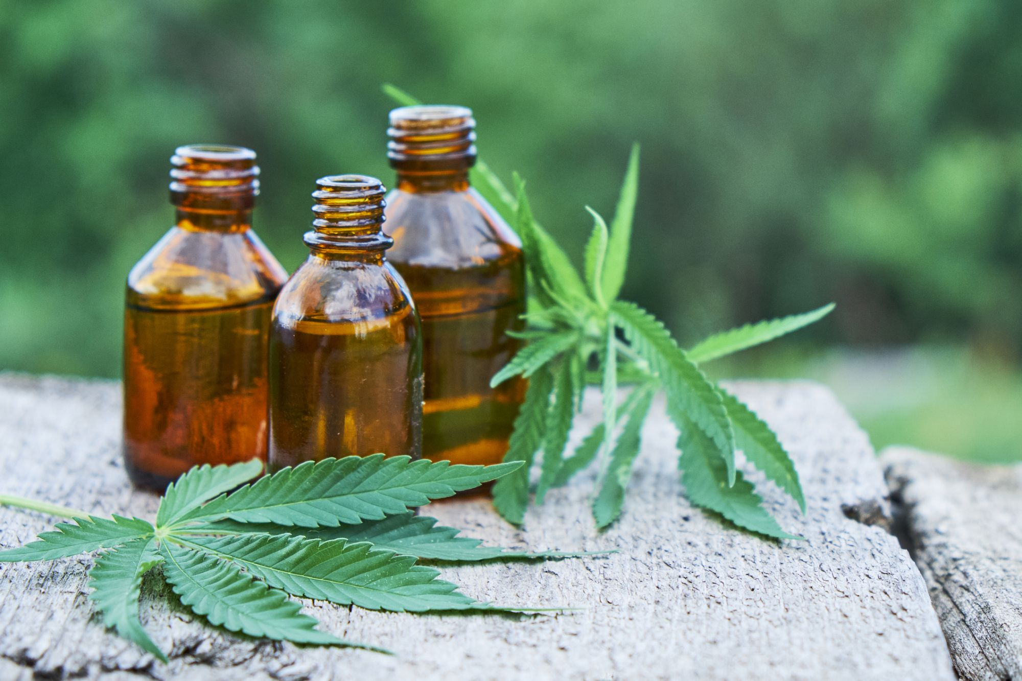 Bottles standing on the background of hemp